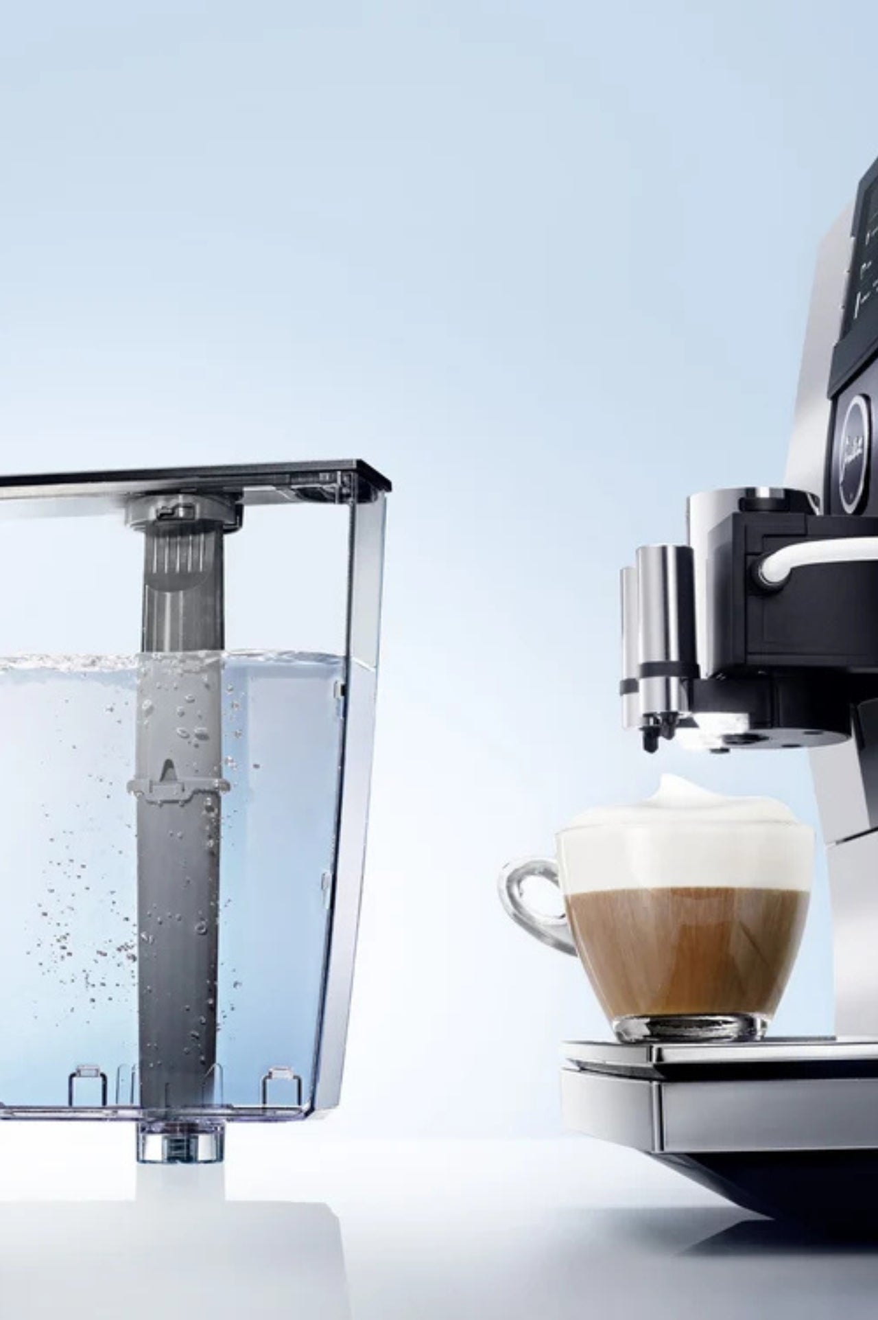 JURA automatic coffee machine displaying a maintenance programme beside genuine JURA care products.