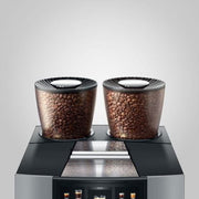 Close-up of dual ceramic grinders and twin bean hoppers on JURA GIGA W10 – built for choice and performance