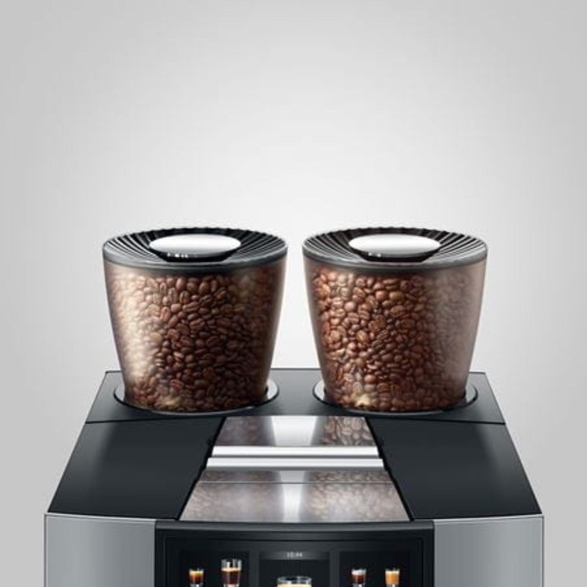 Close-up of dual ceramic grinders and twin bean hoppers on JURA GIGA W10 – built for choice and performance